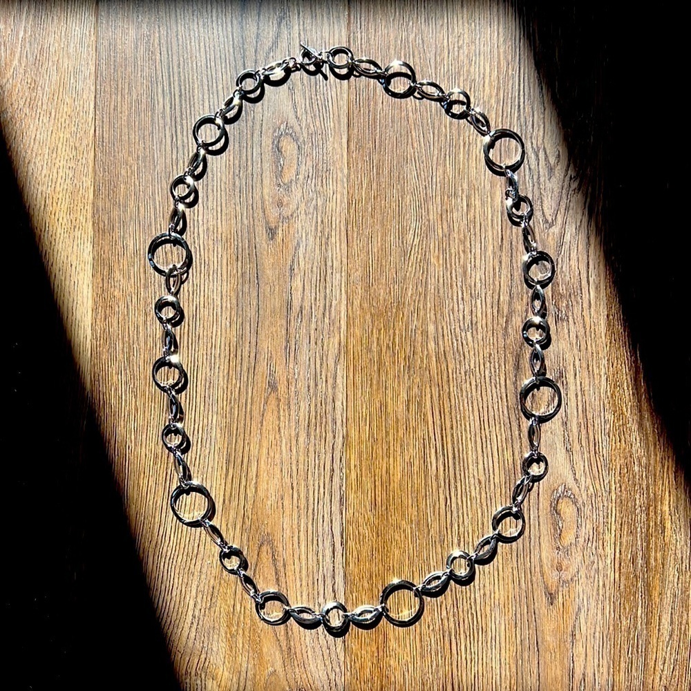 Flat satin finish circles linked together and finished off with a stylish toggle